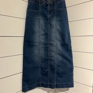 Long Jean skirt. Buttons and zipper on the front. In great condition.